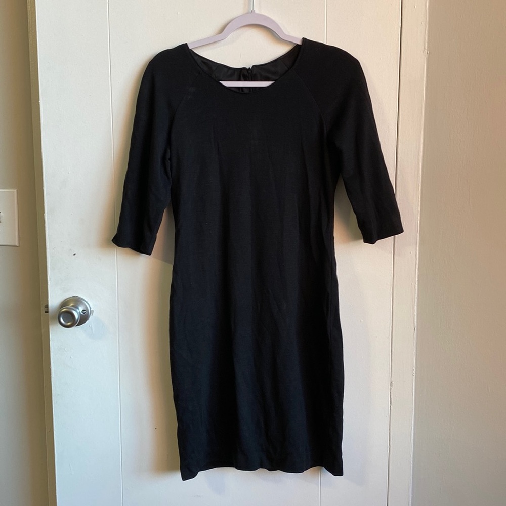 100% Wool form fitting black dress Size M